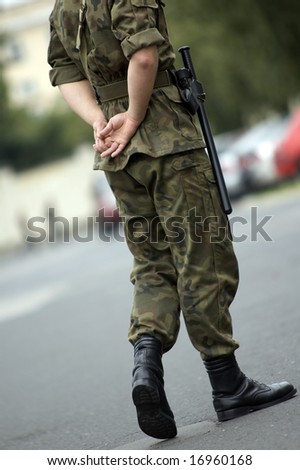 Soldier walking on the street