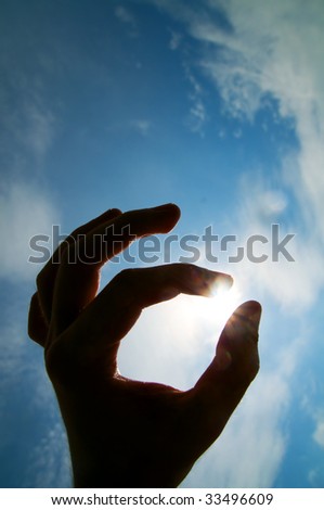 Touching the sun. Conceptual image