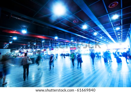 Railway station rush. People motion blur