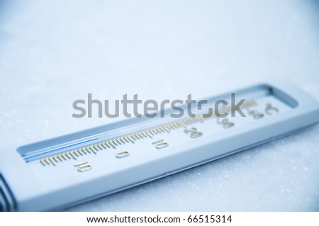 Below zero. Thermometer indicating minus temperature in cold winter.