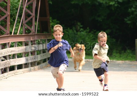 Boys Running with Dog