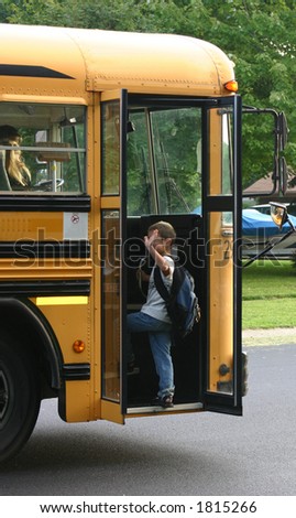 Boy Waving Getting on Bus