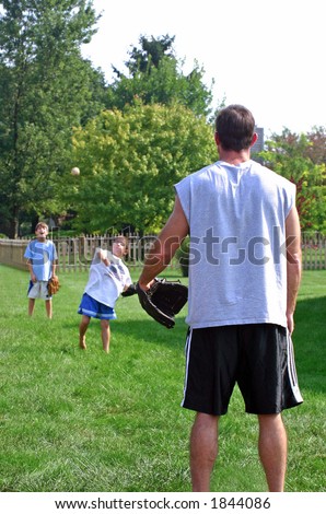 Dad and Boys Playing Catch