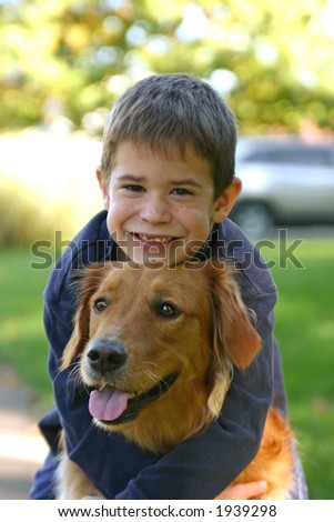 Kid Hugging Dog