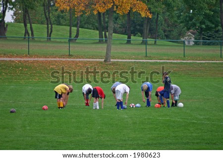 Football Team Stretching