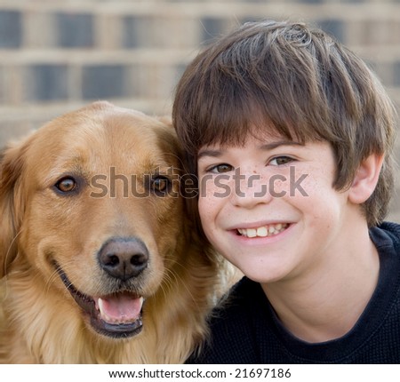 Cute Little Boy Smiling With Dog