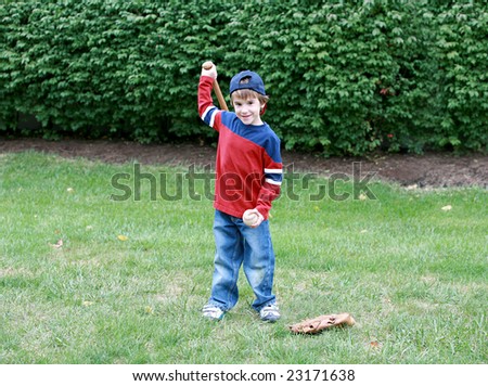 Little Boy Practicing His Baseball