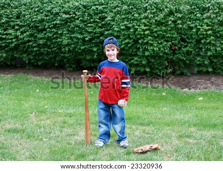 Little Boy Practicing His Baseball