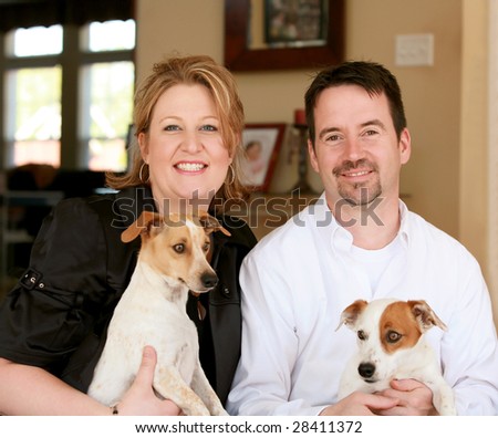 Happy Couple with Their Two Jack Russells