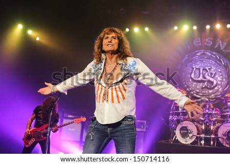 RALEIGH, NC - JULY 31: Lead singer David Coverdale and the classic rock band Whitesnake performs live in concert, on July 31, 2013.