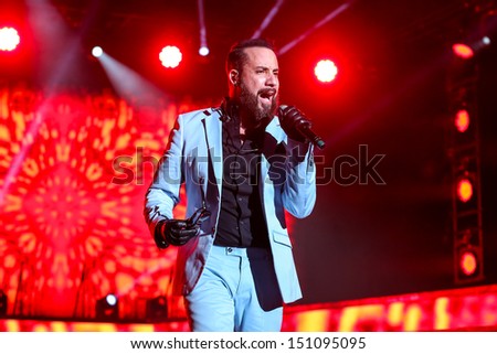 Raleigh, NC - August 20:  A. J. McLean of The Backstreet Boys live in concert on their 20th anniversary and In A World Like This Tour on August 20, 2013 in Raleigh, NC.