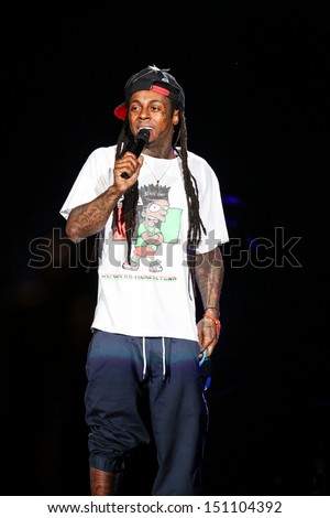 Raleigh, NC - July 27:  Lil Wayne performs in concert as part of his 2013 America\'s Most Wanted Tour on July 27, 2013 in Raleigh, NC.
