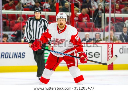 RALEIGH, NC â?? December 7, 2014: Detroit Red Wings left wing Johan Franzen (93) during the NHL game between the Detroit Red Wings and the Carolina Hurricanes at the PNC Arena.
