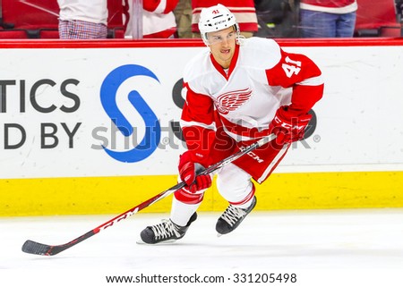 RALEIGH, NC â?? December 7, 2014: Detroit Red Wings right wing Luke Glendening (41) during the NHL game between the Detroit Red Wings and the Carolina Hurricanes at the PNC Arena.