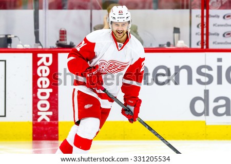RALEIGH, NC â?? December 7, 2014: Detroit Red Wings left wing Tomas Tatar (21) during the NHL game between the Detroit Red Wings and the Carolina Hurricanes at the PNC Arena.