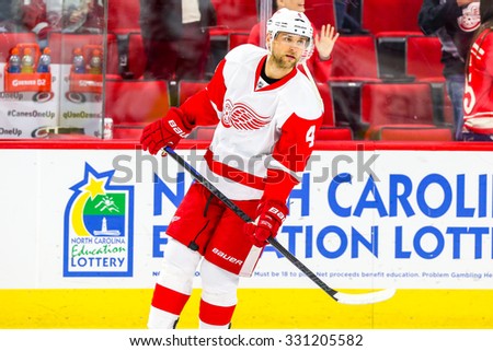 RALEIGH, NC â?? December 7, 2014: Detroit Red Wings defenseman Jakub Kindl (4) during the NHL game between the Detroit Red Wings and the Carolina Hurricanes at the PNC Arena.