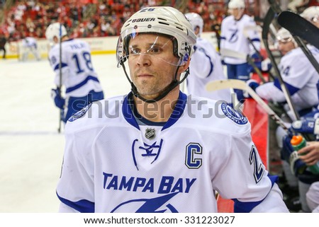 RALEIGH, NC â?? Jan 19, 2014: Tampa Bay Lightning right wing Martin St. Louis (26) during the NHL game between the Tampa Bay Lightning and the Carolina Hurricanes at the PNC Arena.