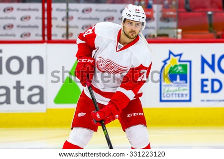 RALEIGH, NC â?? December 7, 2014: Detroit Red Wings left wing Tomas Tatar (21) during the NHL game between the Detroit Red Wings and the Carolina Hurricanes at the PNC Arena.