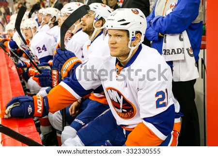 RALEIGH, NC â?? November 7, 2013: New York Islanders right wing KYLE OKPOSO (21) during the NHL game between the New York Islanders and the Carolina Hurricanes at the PNC Arena.