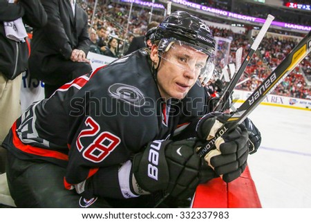 RALEIGH, NC â?? December 20, 2013: Carolina Hurricanes right wing Alexander Semin  during the NHL game between the Washington Capitals and the Carolina Hurricanes at the PNC Arena.