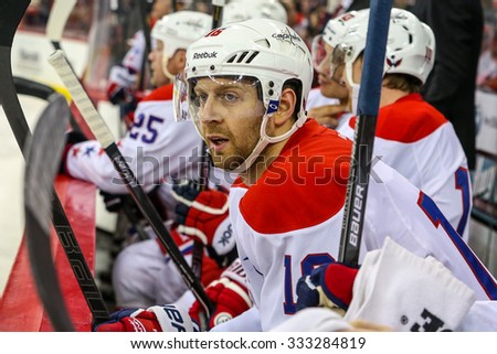 RALEIGH, NC â?? December 20, 2013: Washington Capitals right wing Eric Fehr (16) during the NHL game between the Washington Capitals and the Carolina Hurricanes at the PNC Arena.