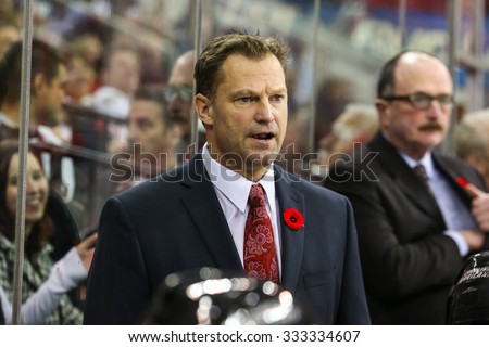 RALEIGH, NC November 7, 2013: Carolina Hurricanes head coach Kirk Muller during the NHL game between the New York Islanders and the Carolina Hurricanes at the PNC Arena.