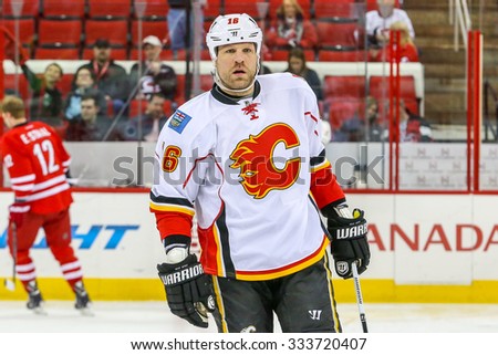 RALEIGH, NC? January 24, 2014: Calgary Flames right wing Brian McGrattan during the NHL game between the Calgary Flames and the Carolina Hurricanes at the PNC Arena.
