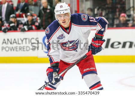 RALEIGH, NC â?? September 21, 2014: Columbus Blue Jackets right wing Cam Atkinson (13) during the NHL game between the Columbus Blue Jackets and the Carolina Hurricanes at the PNC Arena.
