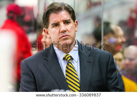 RALEIGH, NC - December 2, 2014: Nashville Predators head coach Peter Laviolette during the NHL game between the Nashville Predators and the Carolina Hurricanes at the PNC Arena.