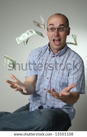 Man  Throwing Money Into Air