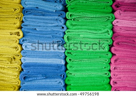 Pile of colorful fresh dry towels.