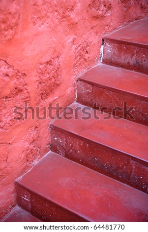 Old, vintage red stone steps.