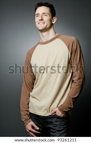 Young handsome happy man wearing casual cloths.
