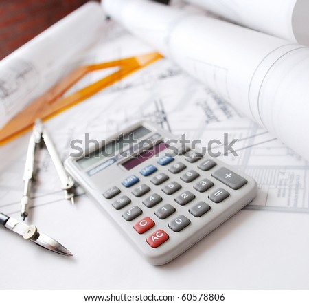 Calculator and drafting tools ot architectural desk