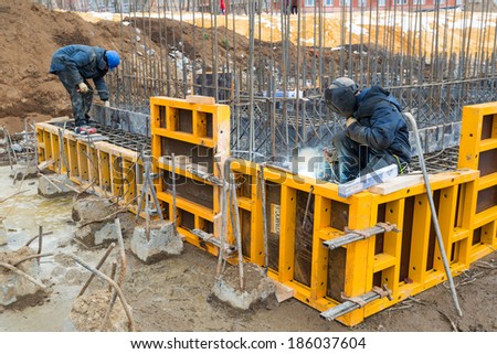 MOSCOW - APRIL 3: Construction site welders on april 3, 2014 in Moscow, Russia. Urban construction is at a faster pace in Russia.