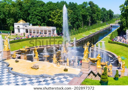 ST PETERSBURG, RUSSIA - JUNE 15, 2014: Grand Cascade and Sea Channel in Peterhof Palace. The Peterhof palace included in the UNESCO\'s World Heritage List.