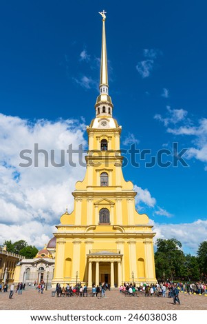 ST PETERSBURG, RUSSIA - JUNE 13, 2014: Tourists visit the Peter and Paul Cathedral. Russian emperors are buried here.