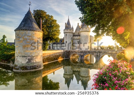 The chateau of Sully-sur-Loire in the sunlight with lens flare, France. This castle is located in the Loire Valley, dates from the 14th century and is a prime example of medieval fortress.