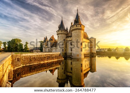The chateau of Sully-sur-Loire at sunset, France. This castle is located in the Loire Valley, dates from the 14th century and is a prime example of medieval fortress.