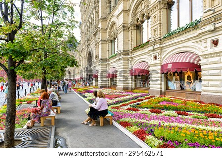 MOSCOW - JULY 10, 2015: Flower Festival near GUM (main department store) on the Red Square. GUM - one of the oldest supermarkets in Moscow.