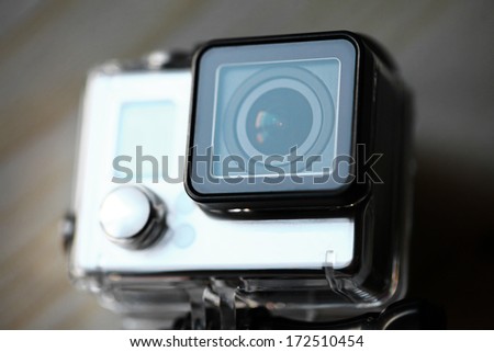 Close up color shot of a small action camera