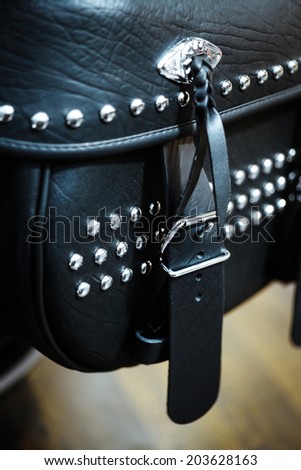 Close-up shot of a leather motorcycle side bag.