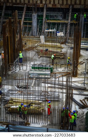 Bucharest, Romania - October 9, 2014: General view of some workers on a construction site in Bucharest, Romania.