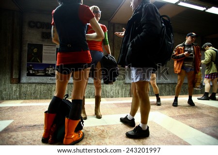 BUCHAREST, ROMANIA - January 11, 2015: People wearing no pants participate in the \'No Pants Subway Ride\' in Bucharest, Romania. No Pants Subway Ride is an annual global event started in USA in 2002.