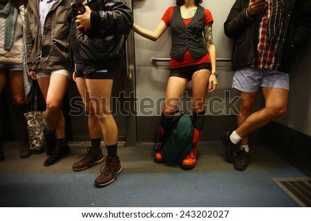 BUCHAREST, ROMANIA - January 11, 2015: People wearing no pants participate in the \'No Pants Subway Ride\' in Bucharest, Romania. No Pants Subway Ride is an annual global event started in USA in 2002.