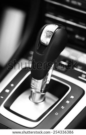 Detail on a automatic gear shifter in a new car