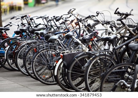 July 12, 2015 - Amsterdam, Netherlands: Color image of a large group of parked bicycles in Amsterdam, Netherlands.