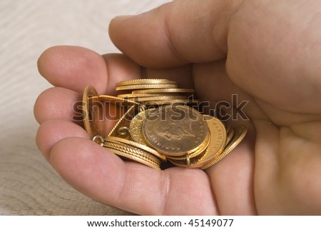 gold money in hand