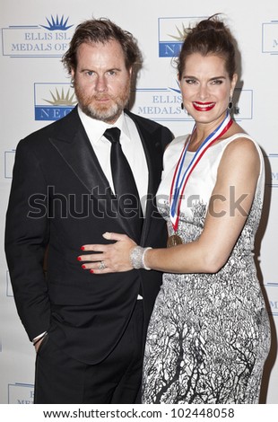 NEW YORK - MAY 12: Actress Brooke Shields and Chris Henchy attend a reception for the 2012 Ellis Island Medals of Honor at Ritz Carlton Battery Park on May 12, 2012 in New York City.