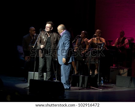 NEW YORK - MAY 17: Bono and Quincy Jones speak on stage as the Jazz Foundation of America celebrates A Great Night In Harlem at The Apollo Theater on May 17, 2012 in New York City.
